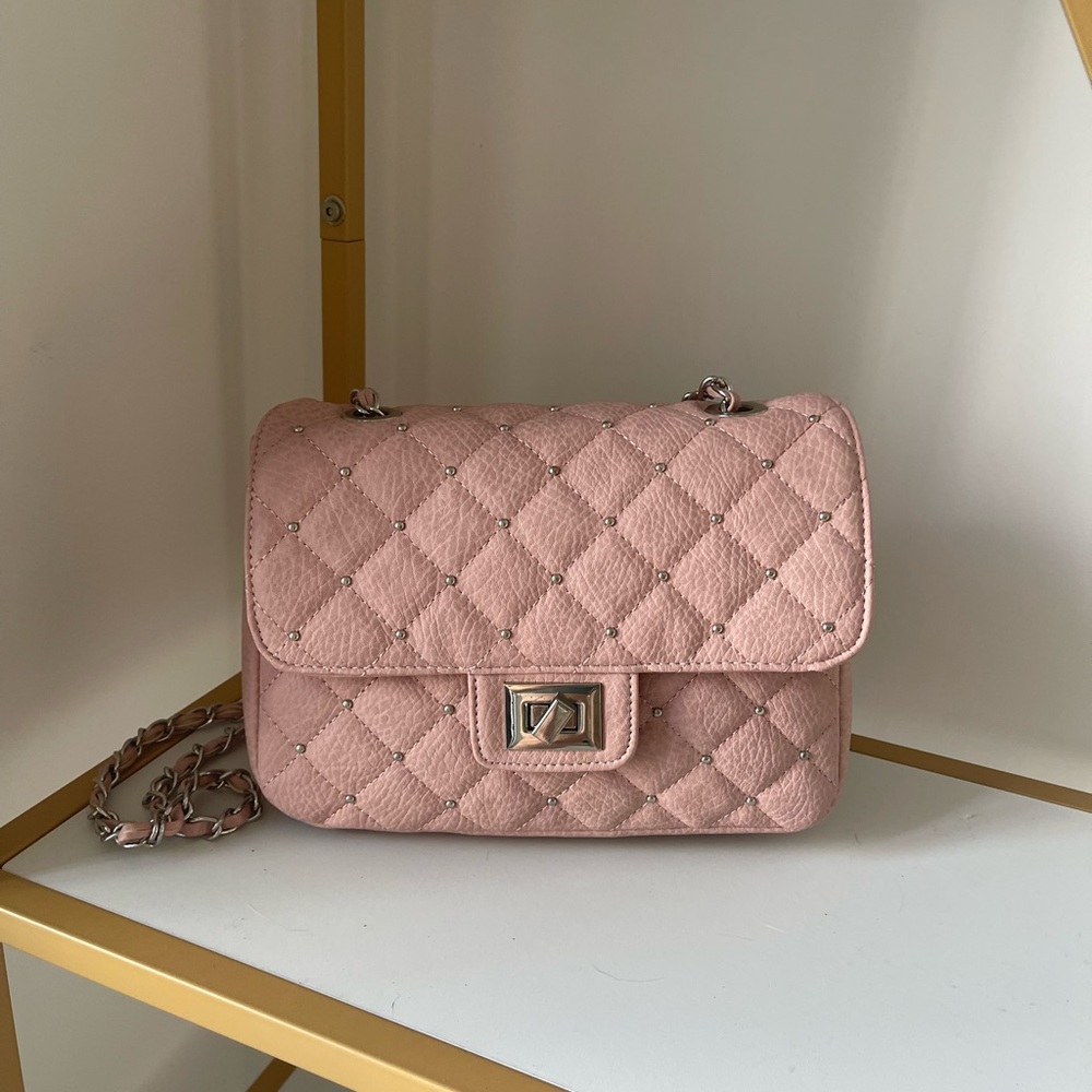 Pink studded shoulder bag